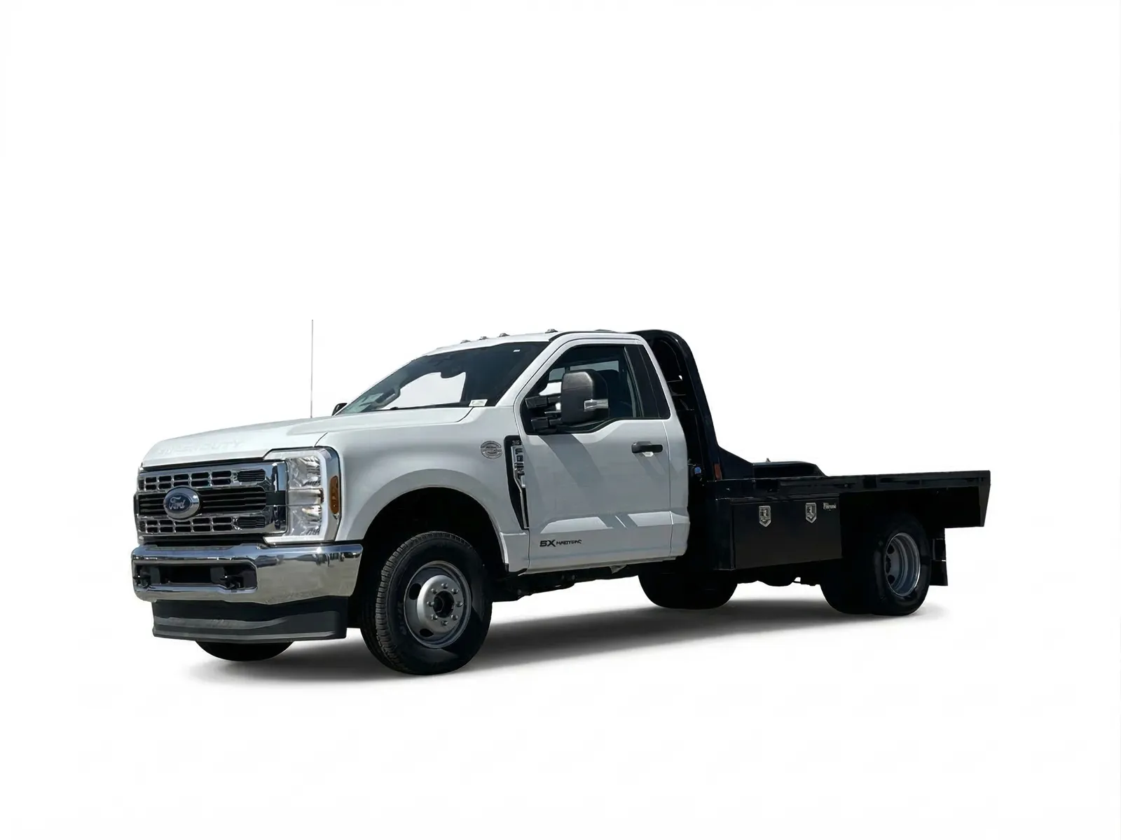 Ford F-350 dually with a steel flatbed, headache rack and underbody toolboxes