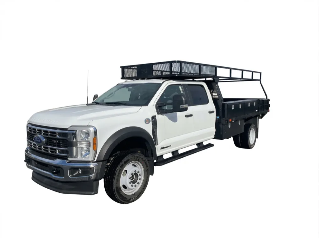 Ford F-450 crew cab with a contractor body, side compartment boxes and a full over-cab rack